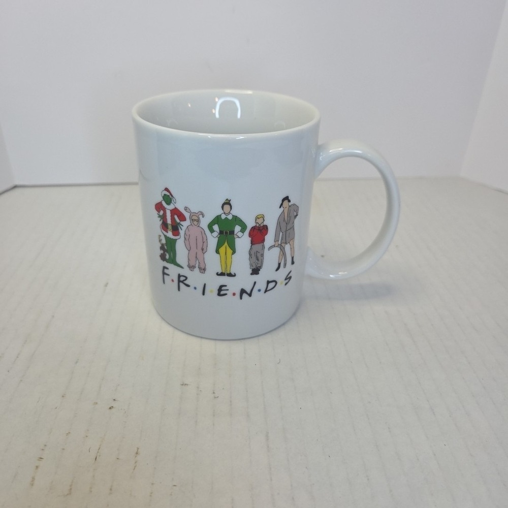 FRIENDS Holiday Christmas Movie Heroes Coffee Mug Buddy Kevin Grinch Ralph Eddie